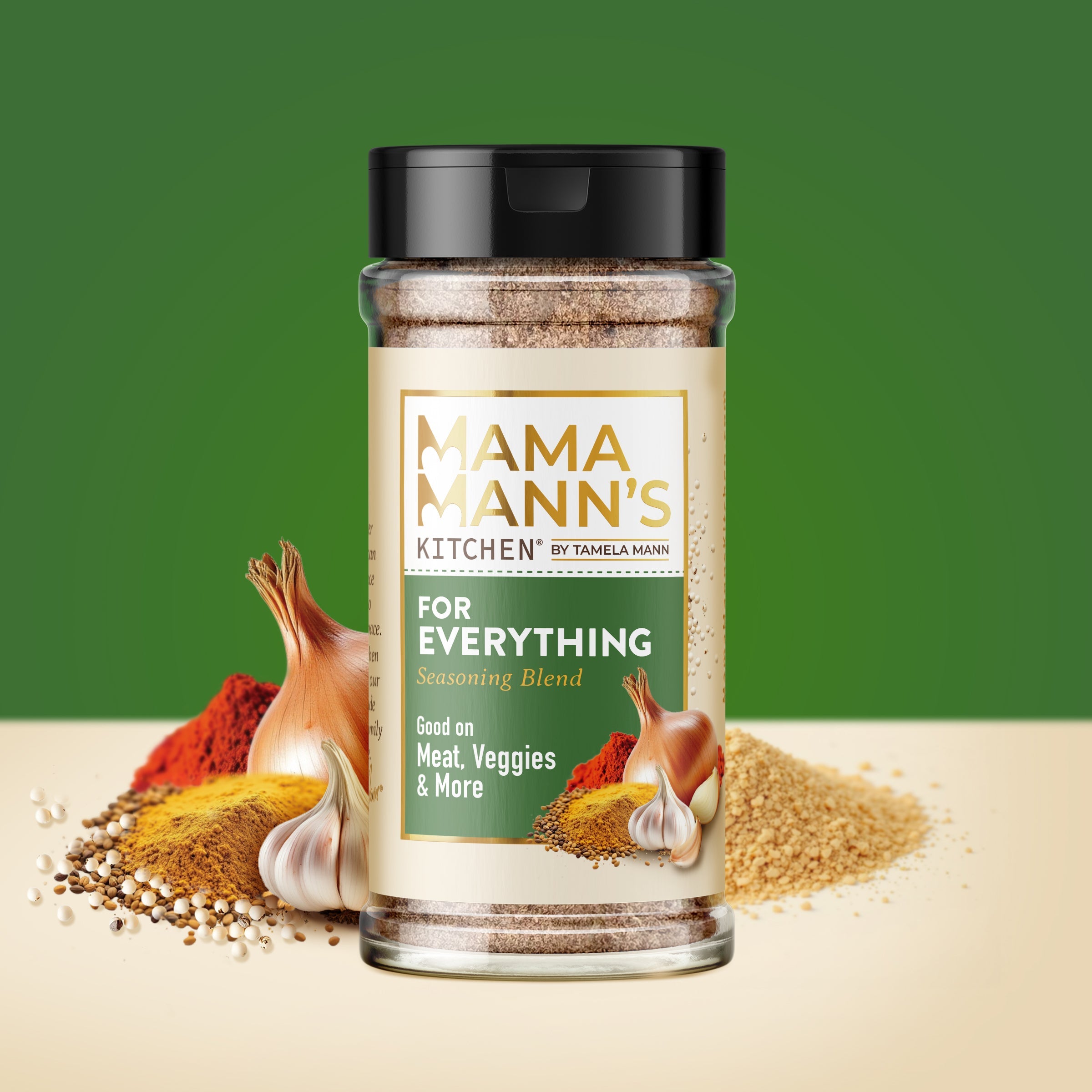 Spice jar labeled 'Mama Mann's Kitchen' with various spices around on a green background