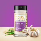 Mama Mann's Kitchen Garlic Mix jar with garlic bulbs and green onions on a purple background